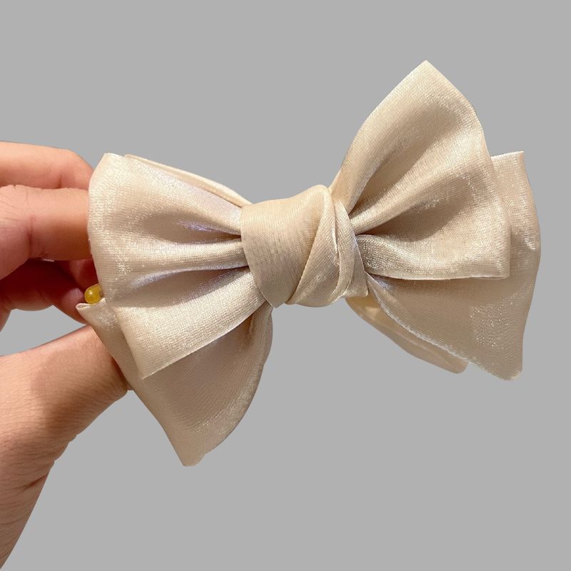 Elegante broche con lazo de color liso para mujer
