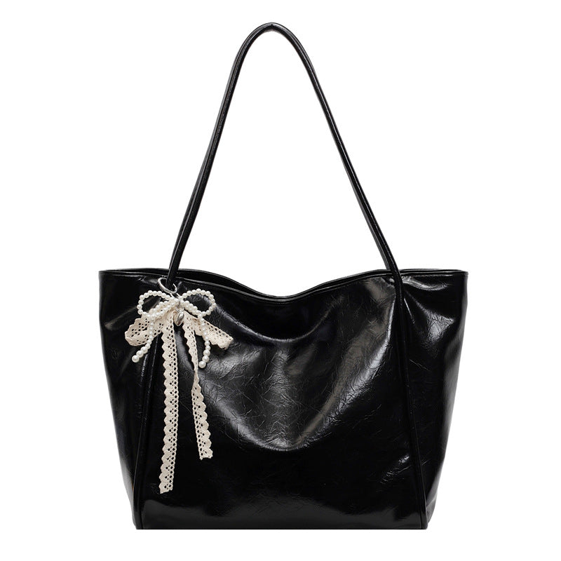 Bolso tote retro de piel encerada con aceite para mujer con colgante de lazo
