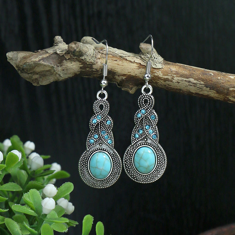 Boucles d'oreilles longues bohèmes en forme de goutte turquoise