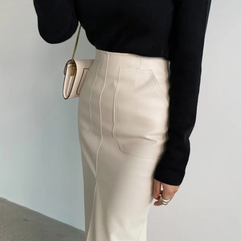 Falda dividida de cuero PU de color sólido sexy de moda para mujer