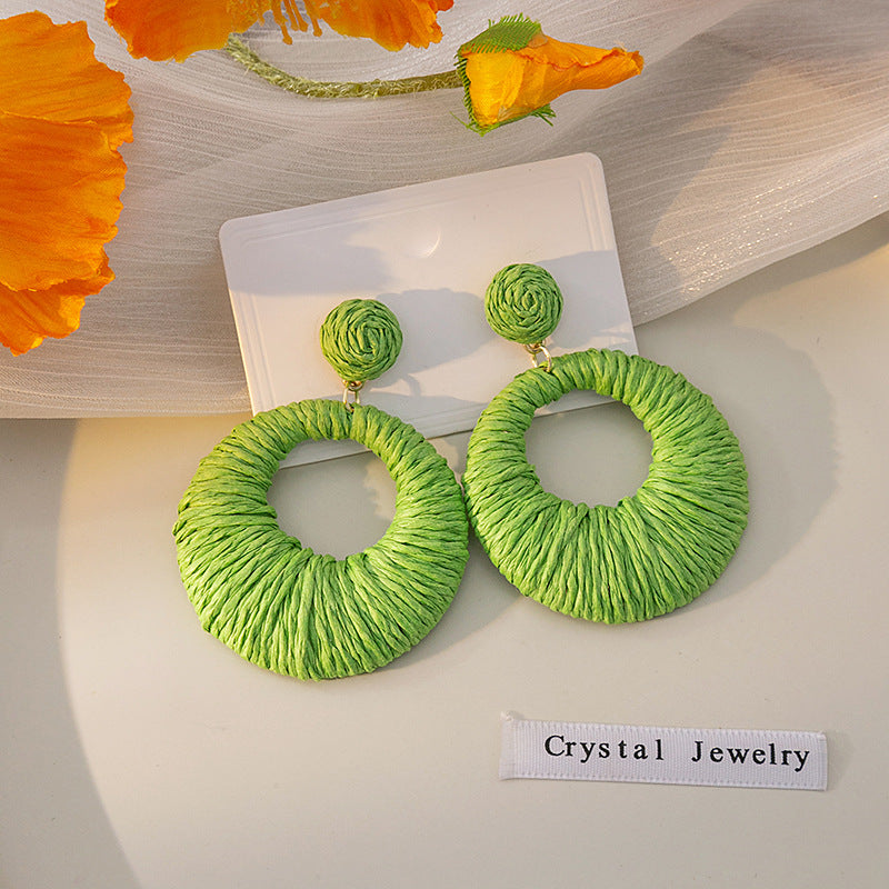 Boucles d'oreilles rondes creuses tissées de style bohème pour les fêtes