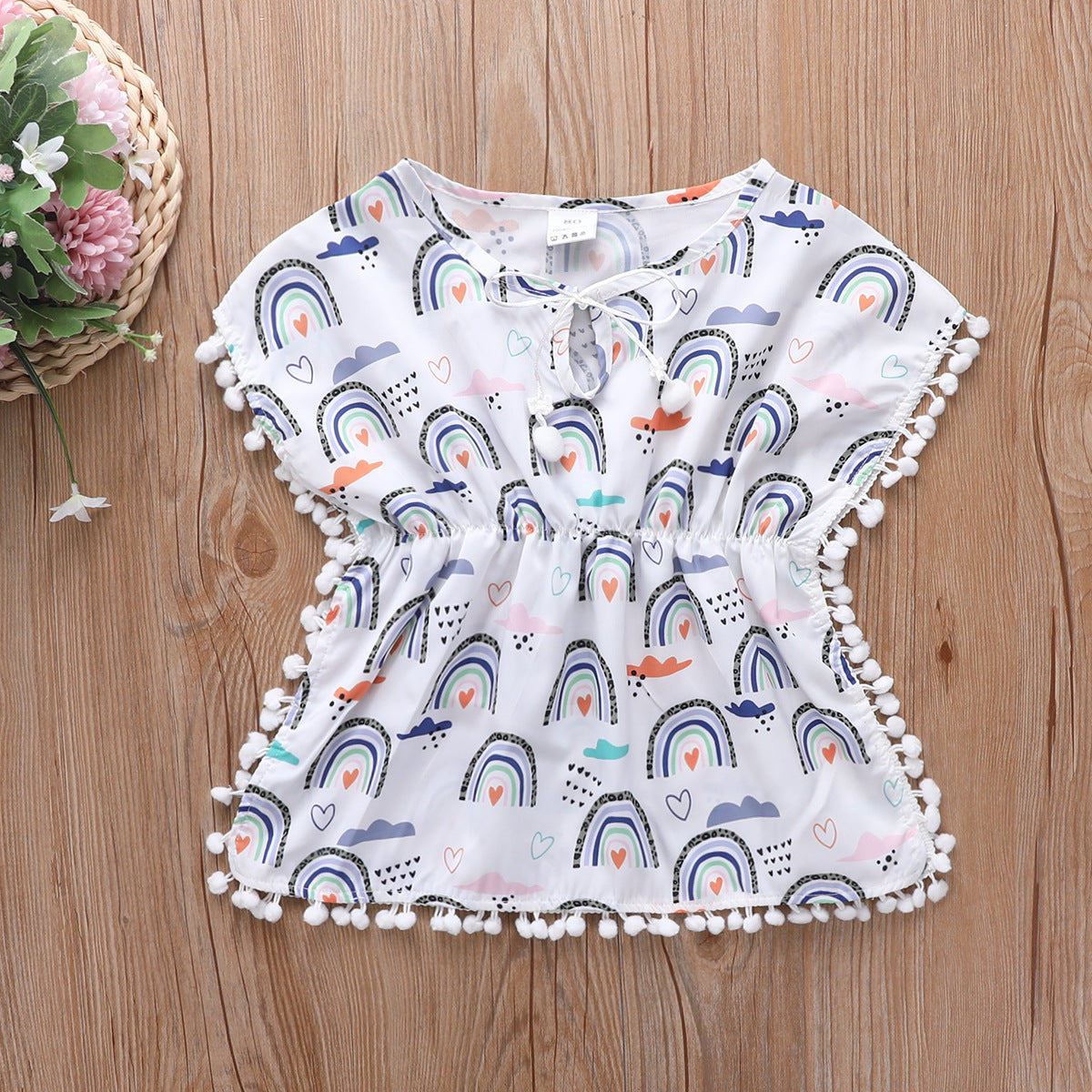 Blusa playera con borlas y pompones para niñas pequeñas