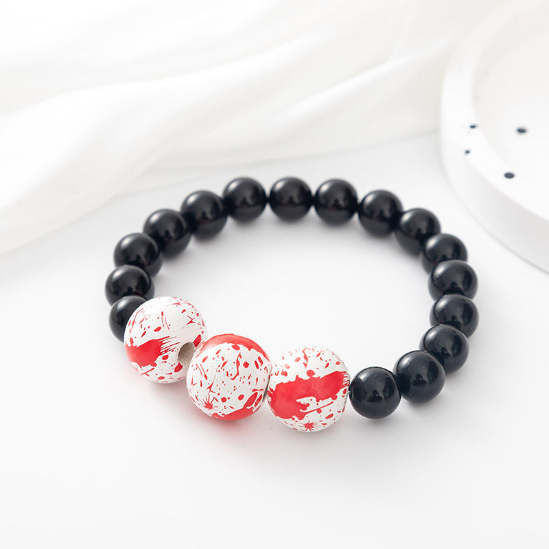 Bracelet de perles d'Halloween avec citrouille et crâne de dessin animé