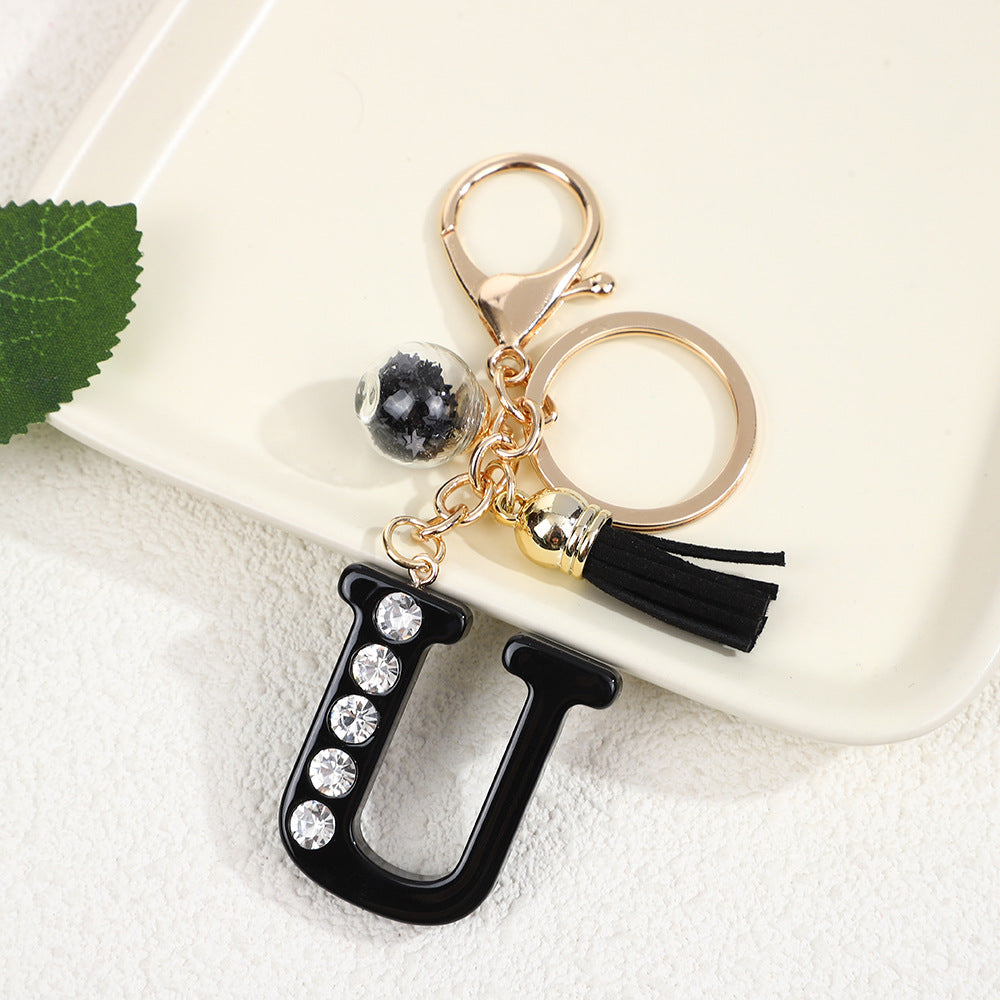 Llavero de resina negra con letras de diamantes de imitación, accesorio de arte moderno