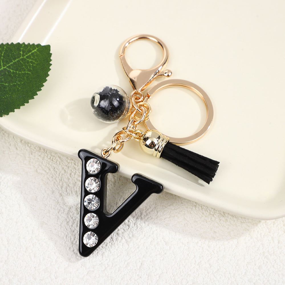 Llavero de resina negra con letras de diamantes de imitación, accesorio de arte moderno