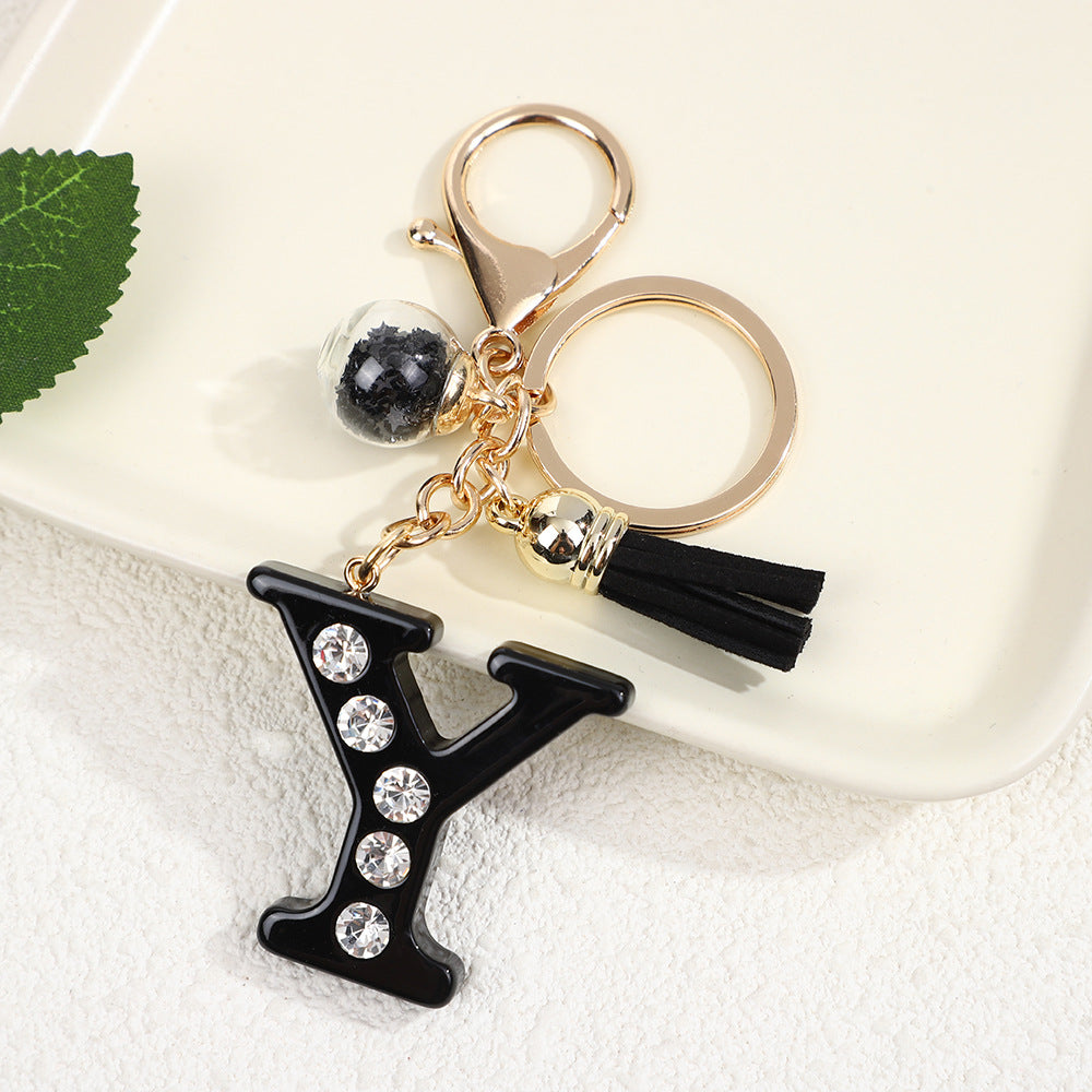 Llavero de resina negra con letras de diamantes de imitación, accesorio de arte moderno