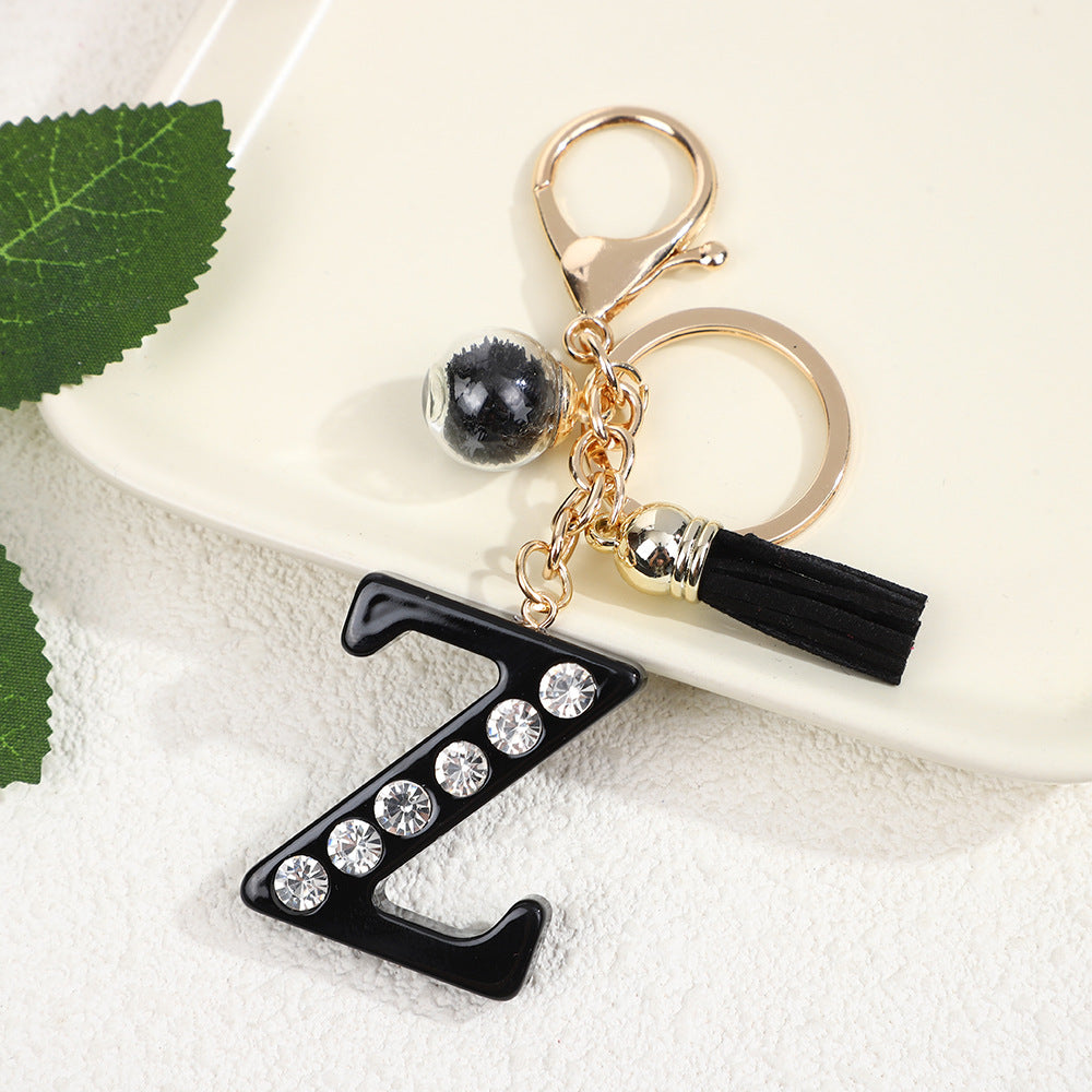Llavero de resina negra con letras de diamantes de imitación, accesorio de arte moderno
