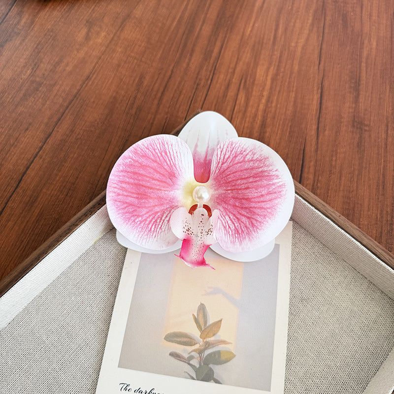 Accesorios florales para el cabello con mariposas para la playa
