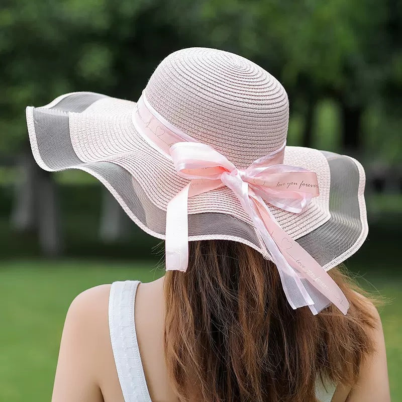 Sombrero de paja con lazo para playa, vacaciones y moda de verano para mujer