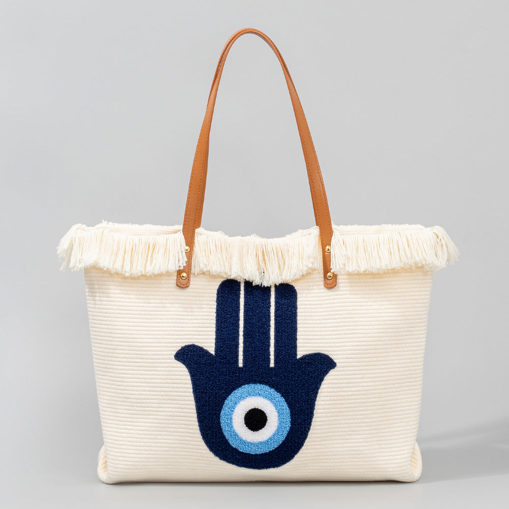 Bolsa de lona bordada con ojos bohemios
