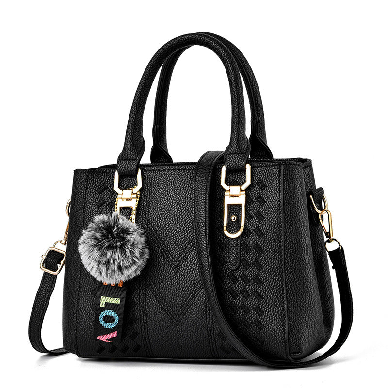 Bolso de mano informal con bola de pelo de color liso para mujer