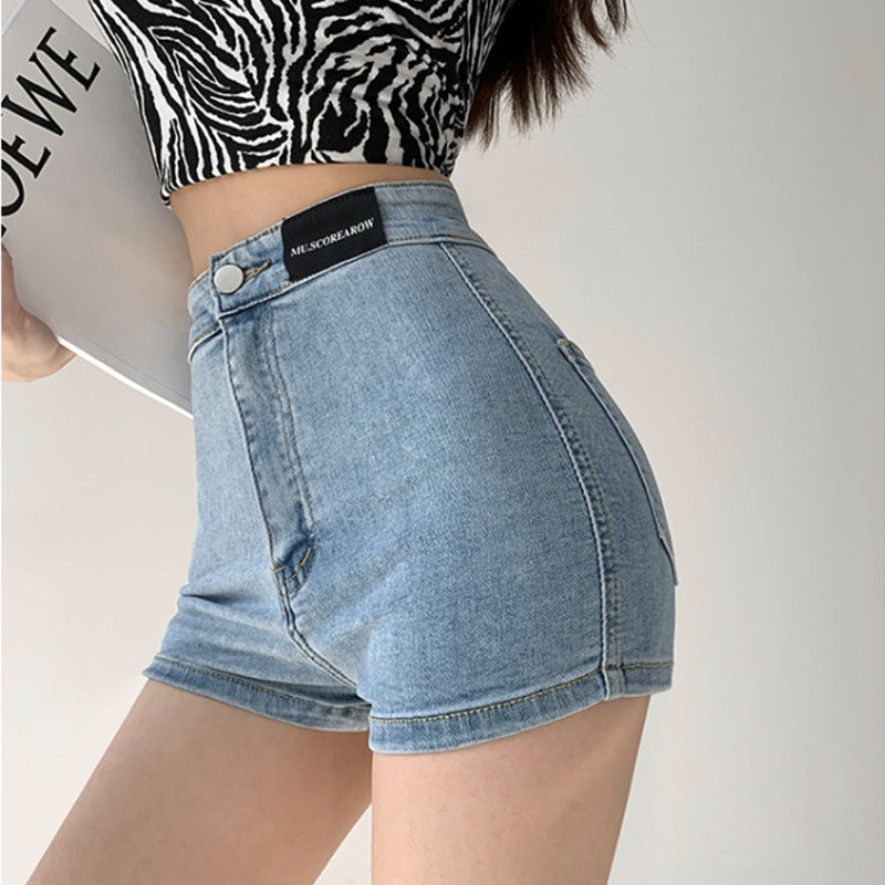 Pantalones cortos vaqueros de cintura alta de color liso sexys a la moda para mujer