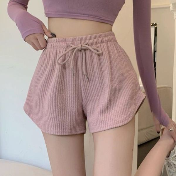 Pantalones cortos holgados de cintura alta con diseño de gofre de color liso a la moda para mujer