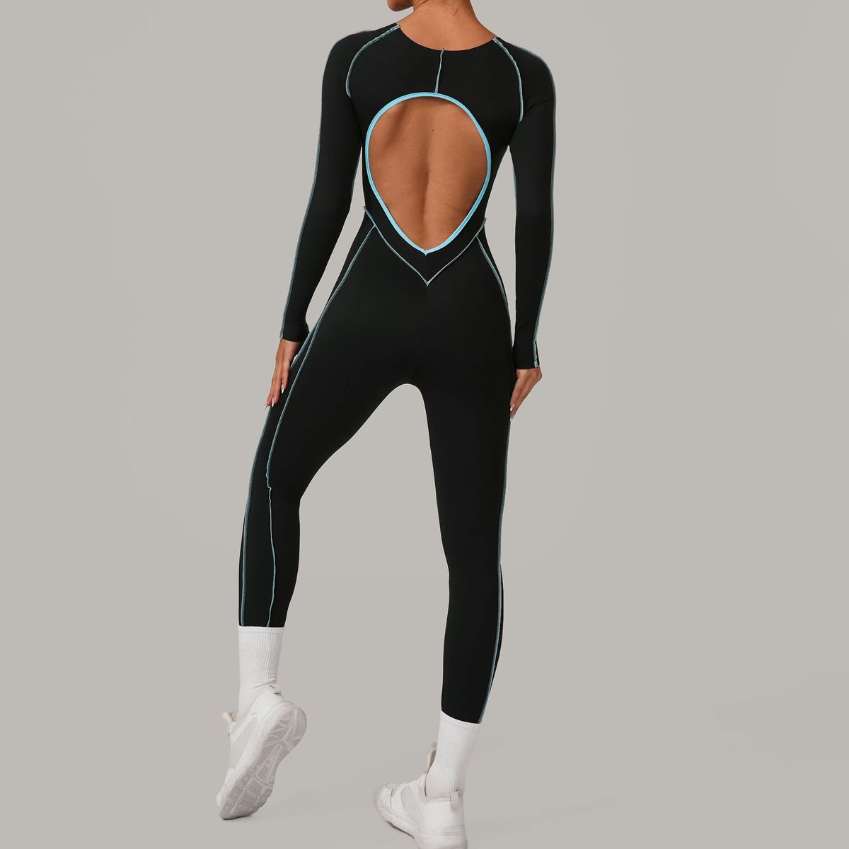 Combinaison de yoga dos nu à manches longues et couleurs assorties pour femmes