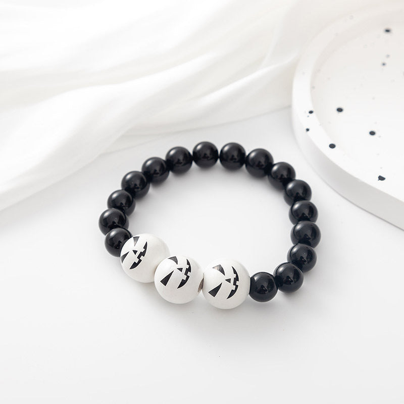 Pulsera de cuentas de Halloween con calabaza y calavera de dibujos animados
