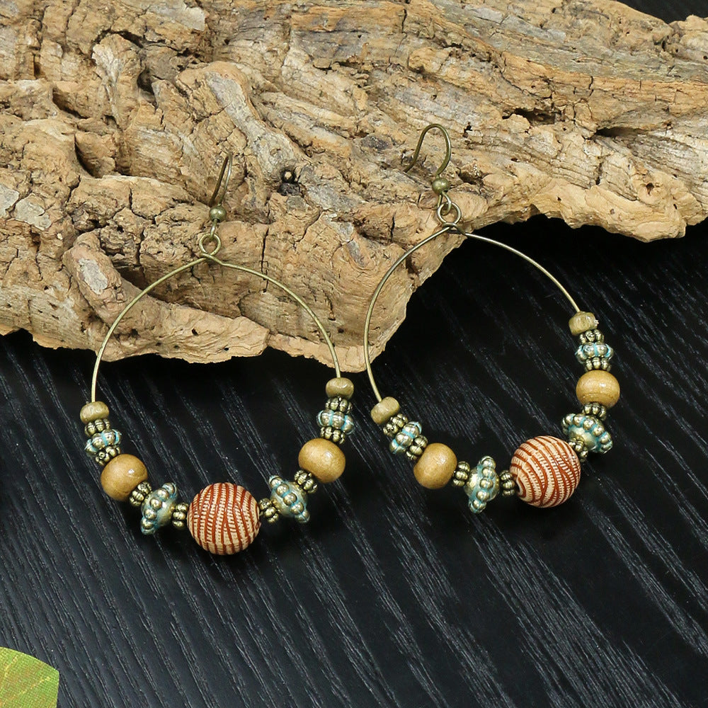 Boucles d'oreilles bohèmes à pampilles géométriques en forme de goutte d'eau