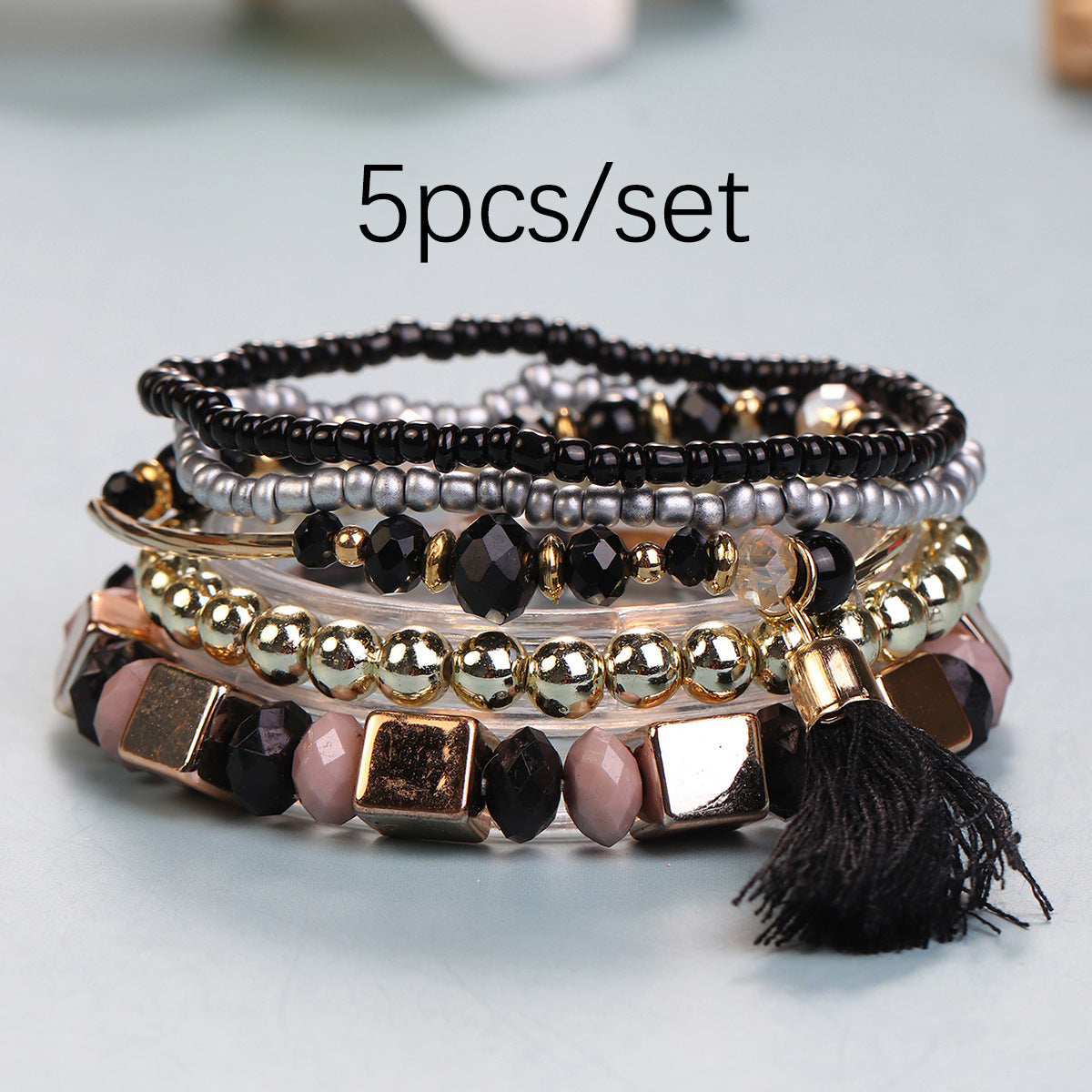Conjunto de pulseras multicapa con flecos y cuentas bohemias