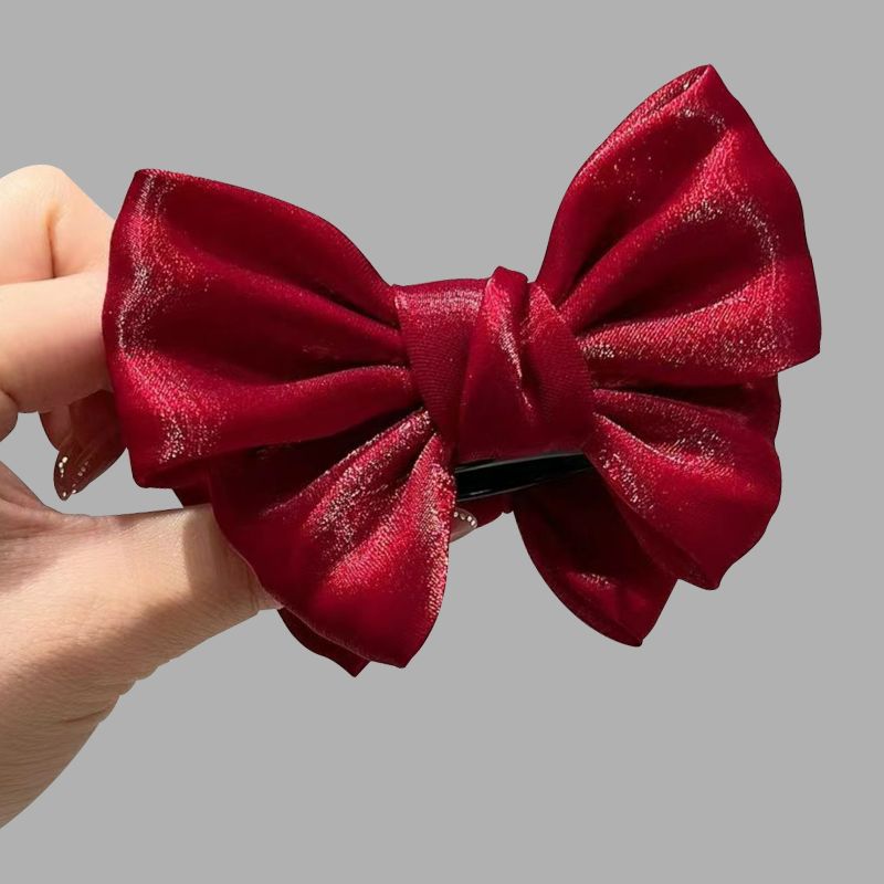 Elegante broche con lazo de color liso para mujer