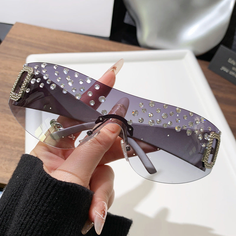 Gafas de sol de moda sin marco de un solo cuerpo con diamantes de imitación