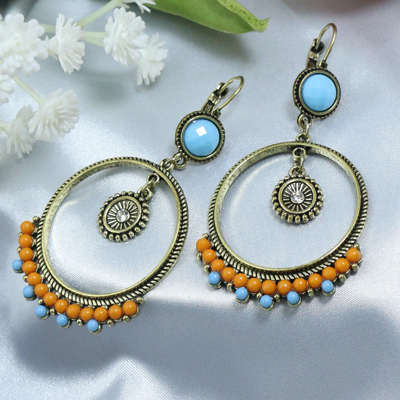 Boucles d'oreilles à pompons créatives de style ethnique bohème rétro