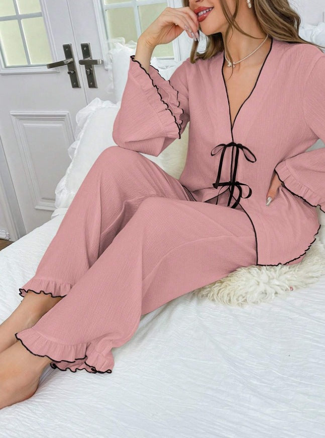 Conjunto de top informal de manga larga con cuello en V y pantalones holgados para mujer