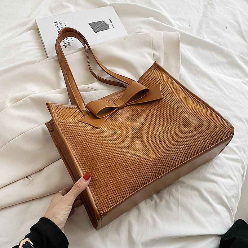 Bolso de mano de verano para mujer, de color liso y moderno.