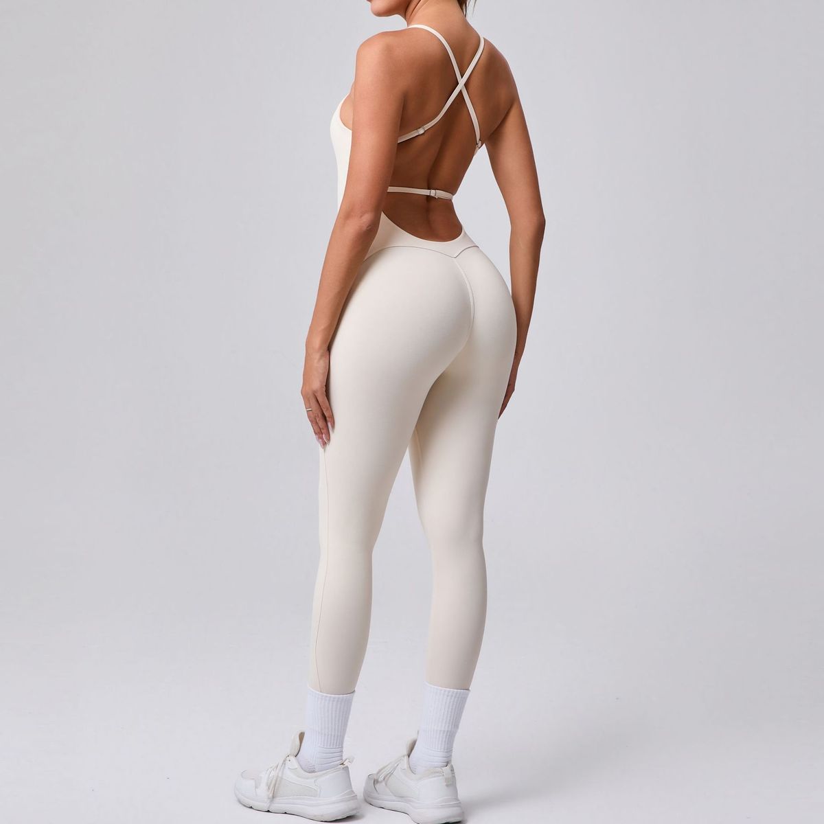 Combinaison de yoga dos nu à bretelles spaghetti sans coutures pour femme