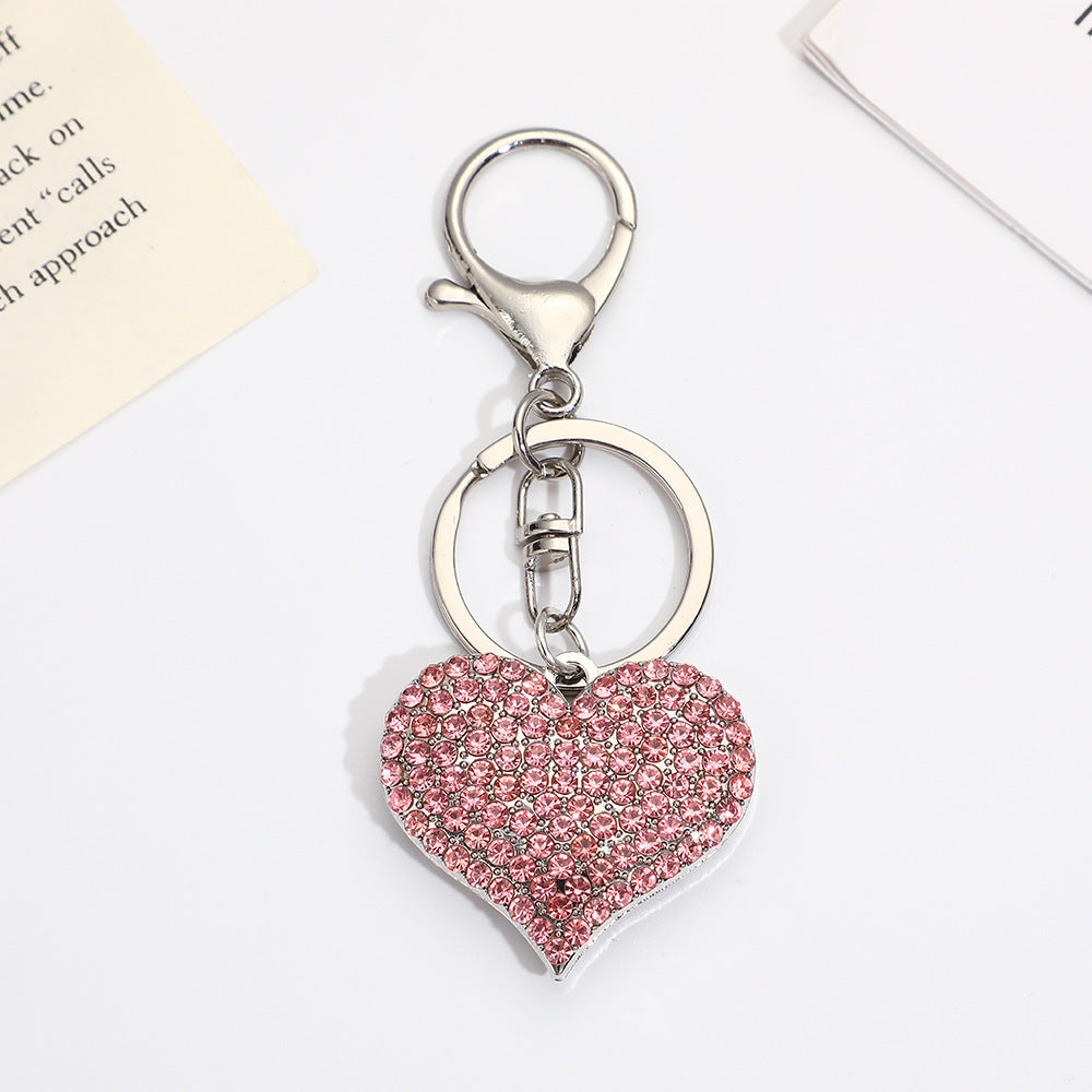 Llavero con colgante de corazón de diamantes de imitación para mujer