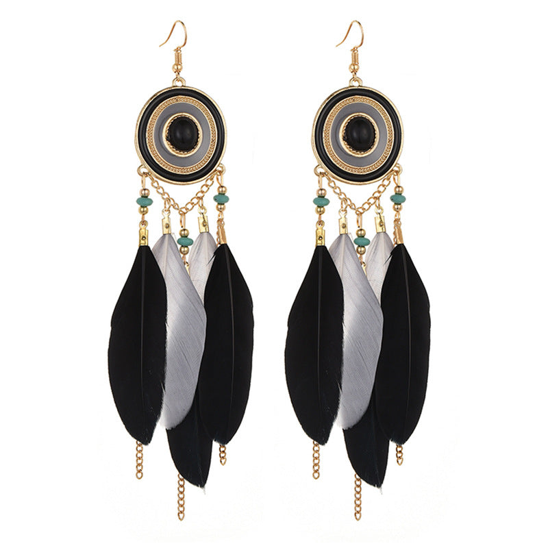 Pendientes bohemios con borlas de plumas exageradas