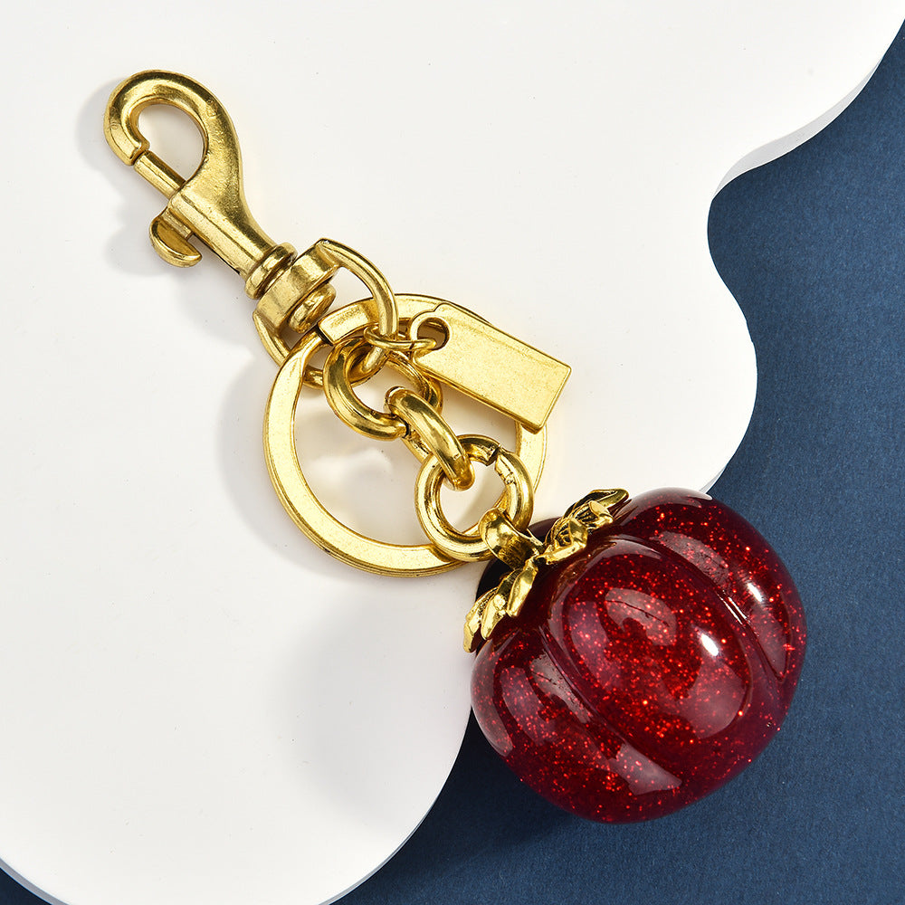 Llavero con colgante de bolsa de caqui de moda - Decoración metálica estilo fruta