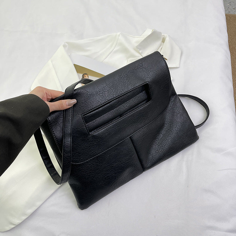 Bolso de mano tipo sobre de color liso para mujer, sencillo y moderno.