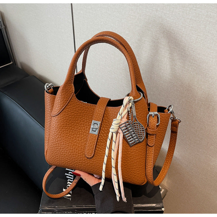 Sac à main seau décontracté de couleur unie pour femme avec motif litchi