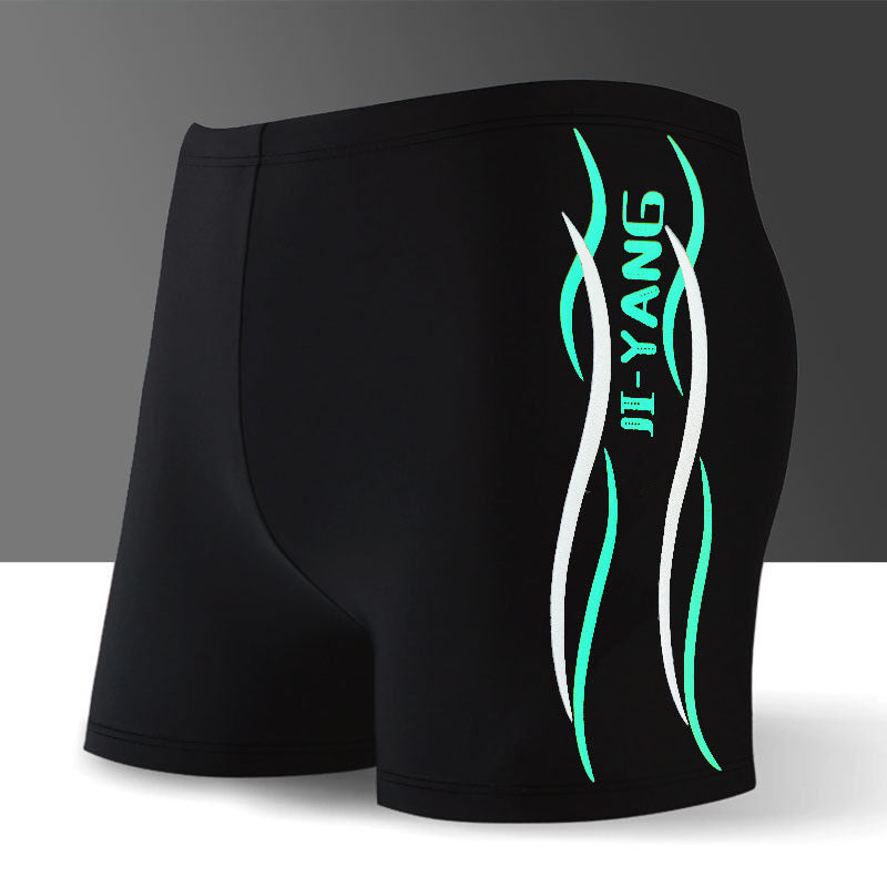 Traje de baño de ángulo plano con estampado de letras y colores a juego para hombre