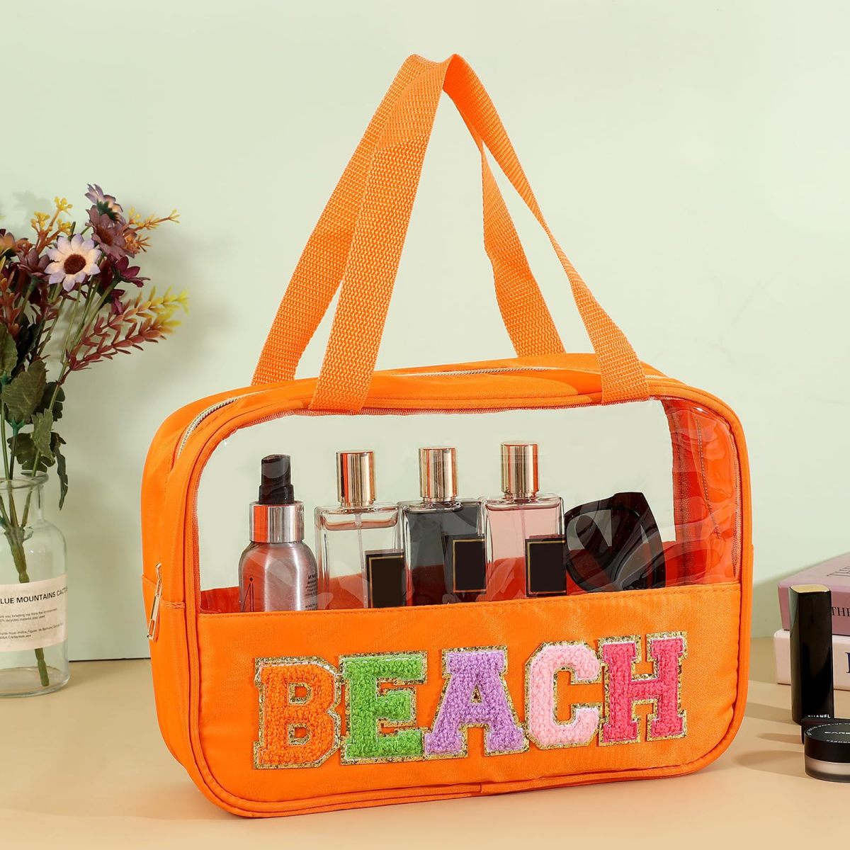 Bolsa de cosméticos transparente de PVC con letras bordadas