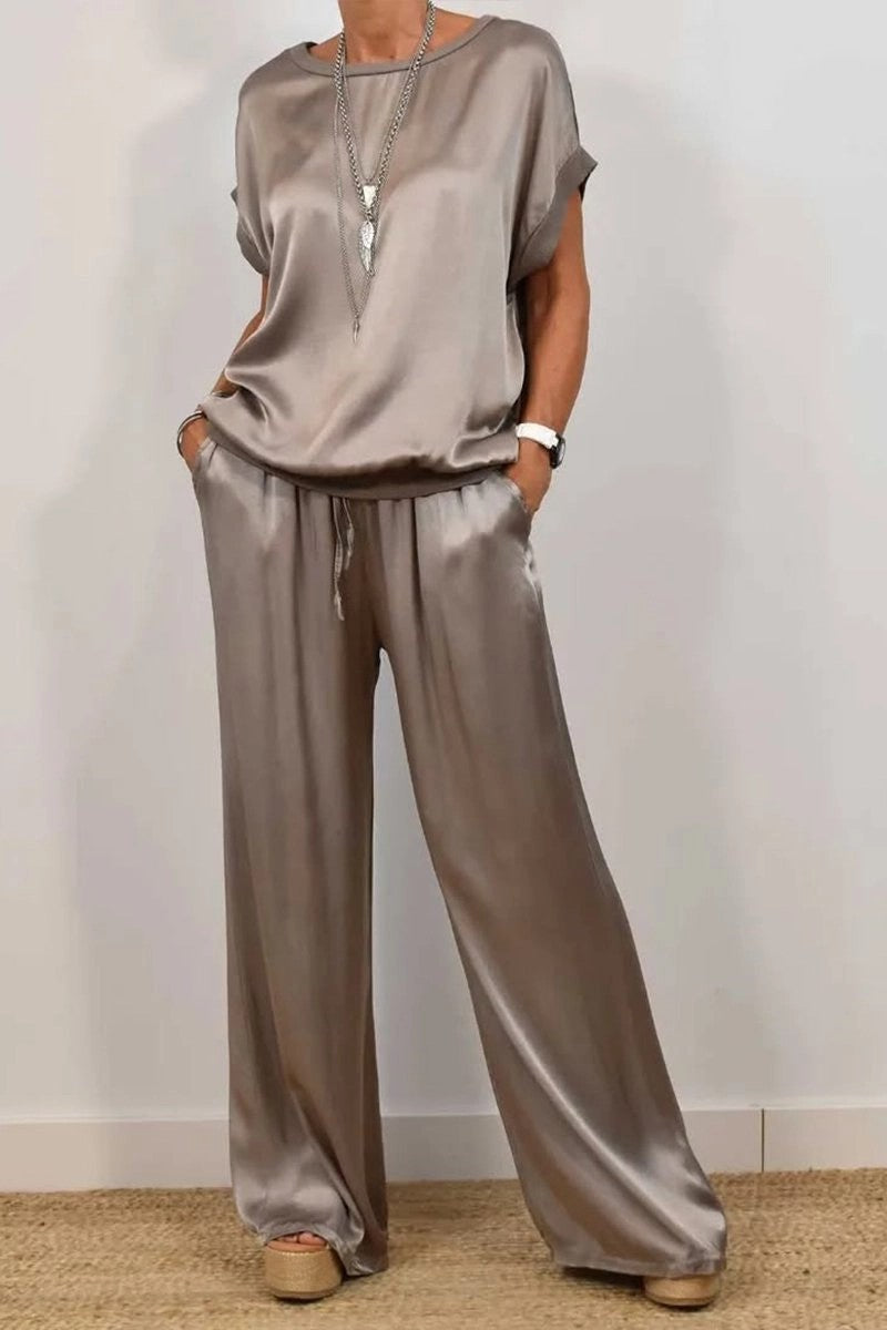 Conjunto de dos piezas de camiseta holgada de manga corta y pantalón ancho de color liso para mujer