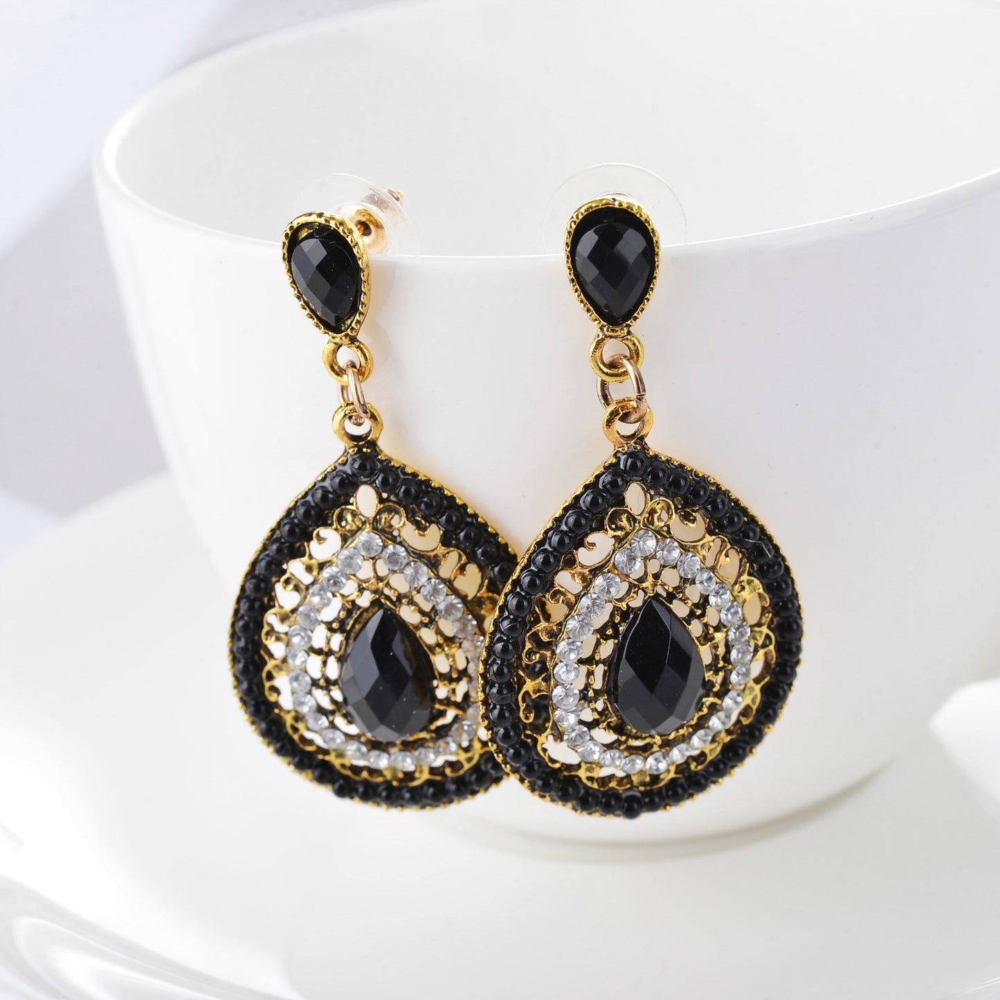 Pendientes colgantes con piedras preciosas huecas de estilo bohemio para mujer