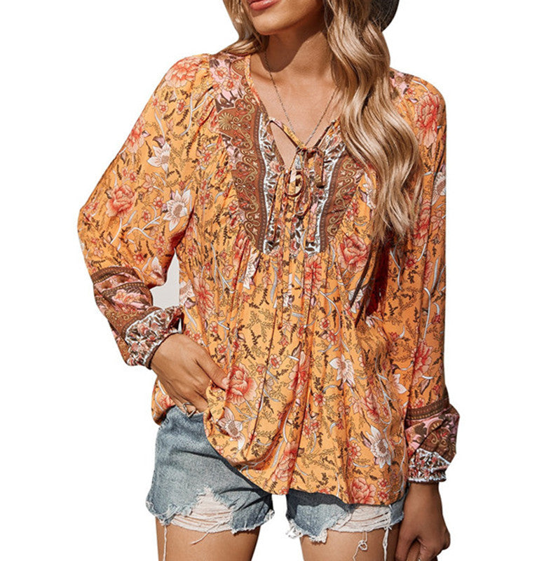 T-shirt décontracté à col en V et imprimé floral pour femme