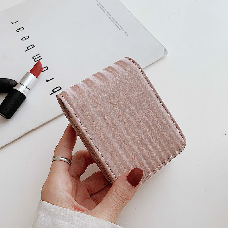 Mini trousse de maquillage portable simple et de couleur unie pour femme