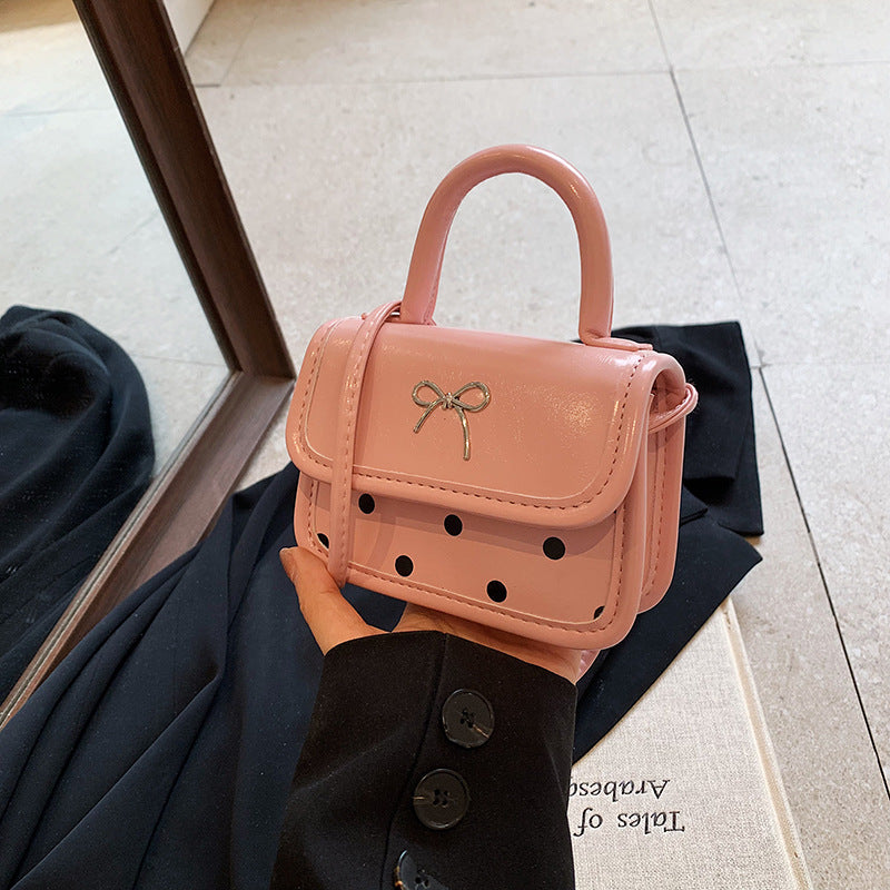 Mini bolso bandolera cuadrado con lazo de moda