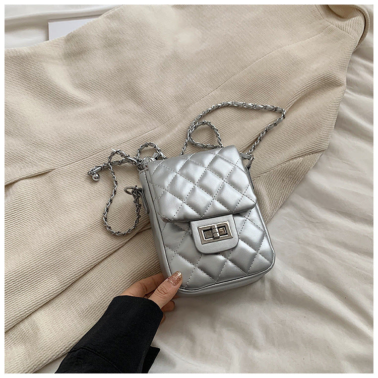 Mini bolso bandolera con bordado romboidal de verano