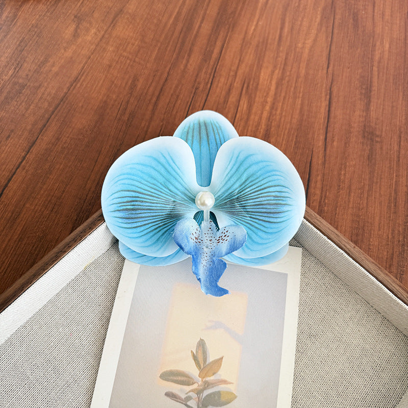 Accesorios florales para el cabello con mariposas para la playa