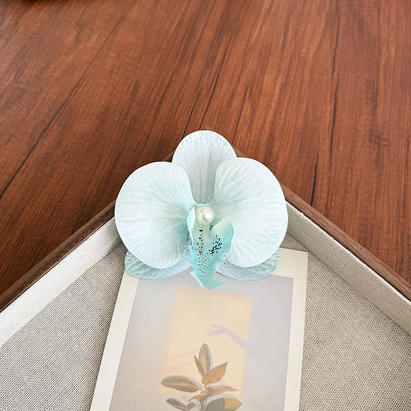Accesorios florales para el cabello con mariposas para la playa