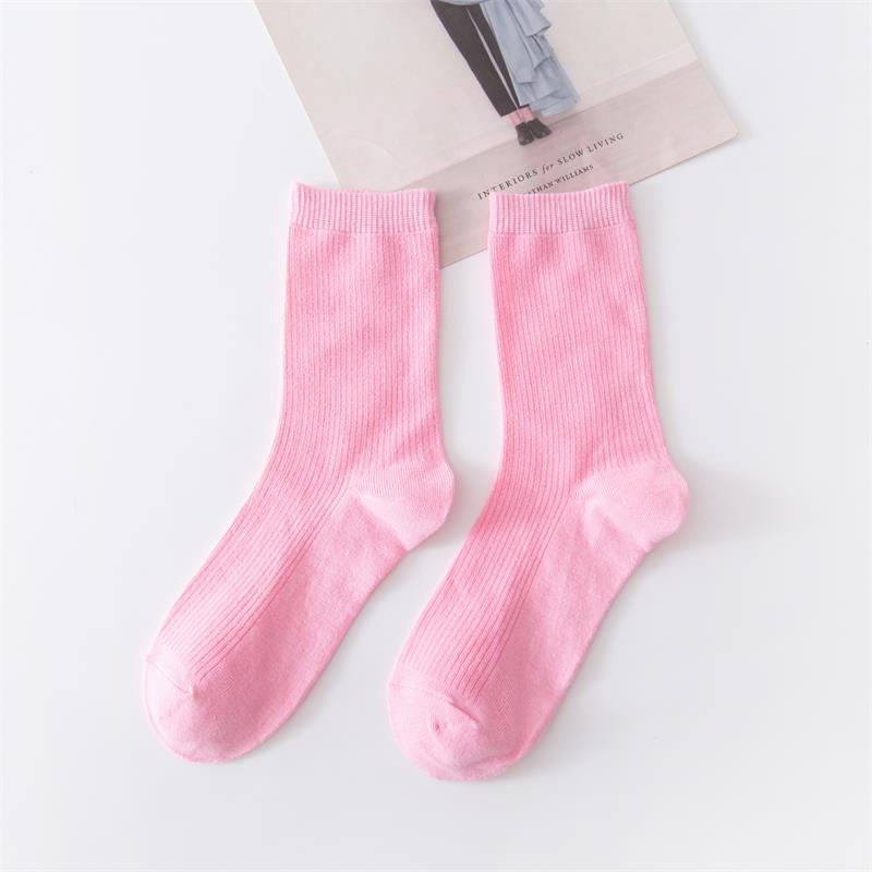 Calcetines de tubo de color liso sencillos a la moda para mujer