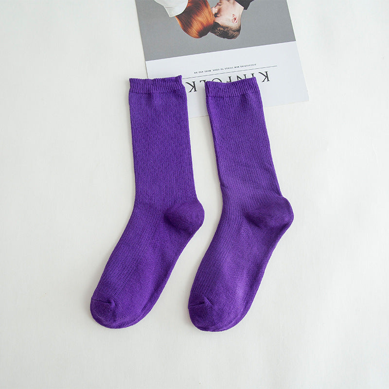 Calcetines de tubo de color liso sencillos a la moda para mujer