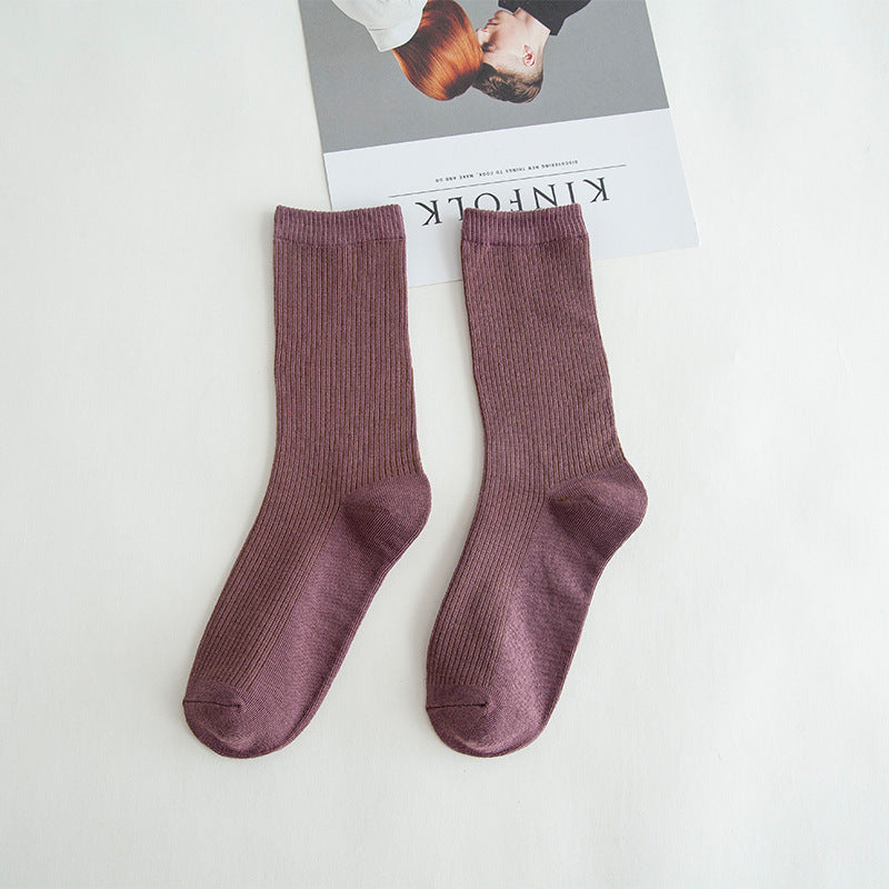Calcetines de tubo de color liso sencillos a la moda para mujer