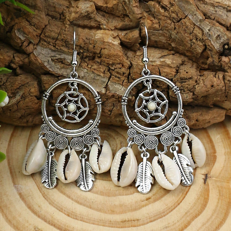Boucles d'oreilles à pompons créatives de style ethnique bohème rétro