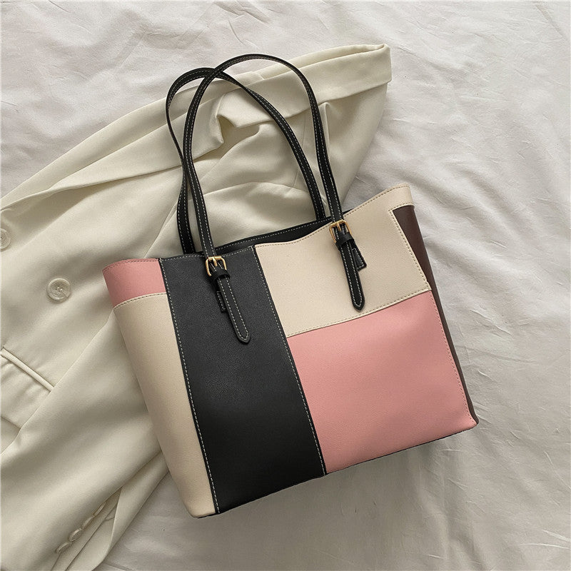 Bolso de mano de gran capacidad con costuras de moda en color