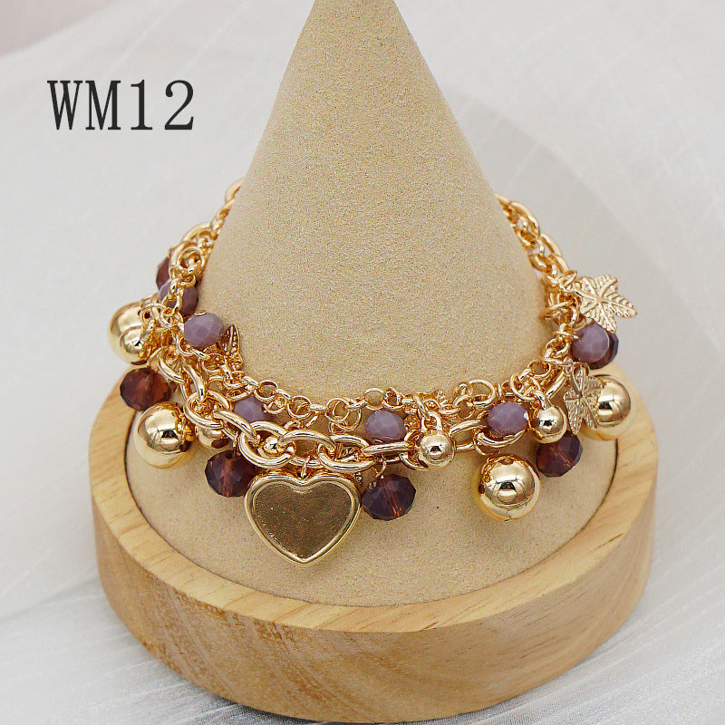Pulsera bohemia con colgante floral en forma de corazón