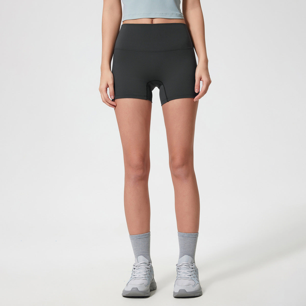 Short de yoga extensible décontracté de couleur unie pour femme