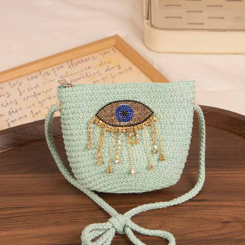 Bolso bandolera informal de paja con diseño de ojo malvado para niñas